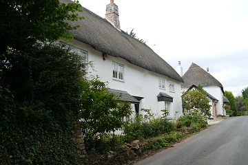 Thatched cottages in Coffinswell village